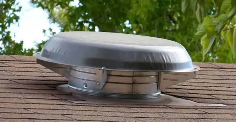 attic fan installation services with low-profile roof ventilation unit in Seattle, WA