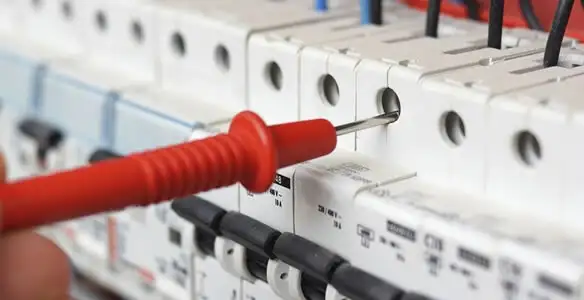 Electrical contractor testing circuit breakers during electrical repair in Bothell, WA