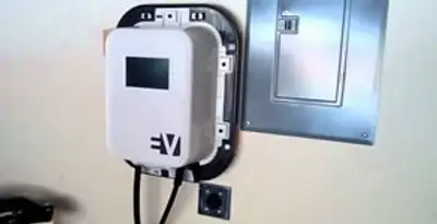 Electric car charger installation with wall-mounted EV charging station in Seattle, WA