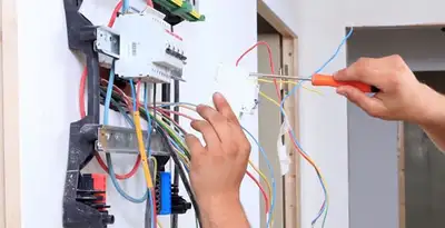 electrician services performing residential electrical panel wiring in Seattle, WA