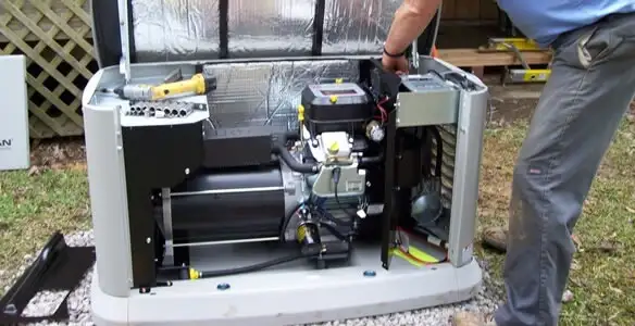 generator installation service showing technician connecting and configuring generator components in Seattle, WA