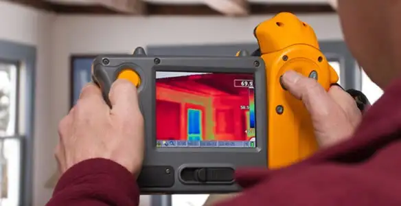 home energy audit service capturing thermal readings to analyze insulation and electrical efficiency in Seattle, WA