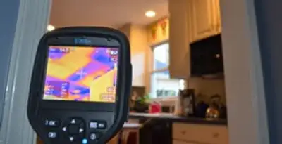 home energy audit service using thermal imaging to evaluate electrical efficiency inside a home in Seattle, WA