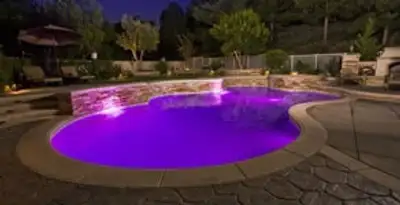 pool light installation and repair services illuminating a residential swimming pool in Seattle, WA
