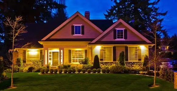security light installation services illuminating a residential exterior at night in Seattle, WA