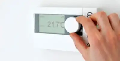 Thermostat installation service with professional adjusting temperature control in Seattle, WA